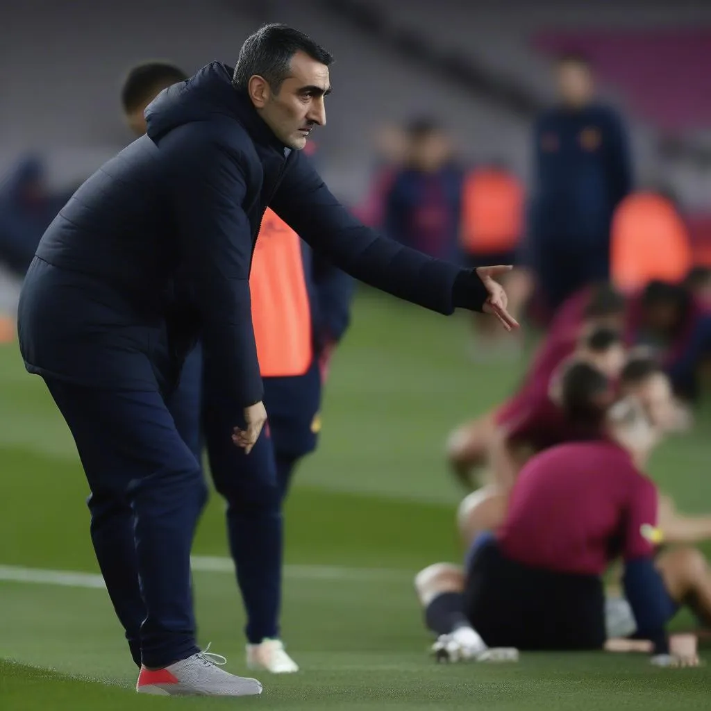 HLV Ernesto Valverde dẫn dắt Barcelona trong trận đấu năm 2018